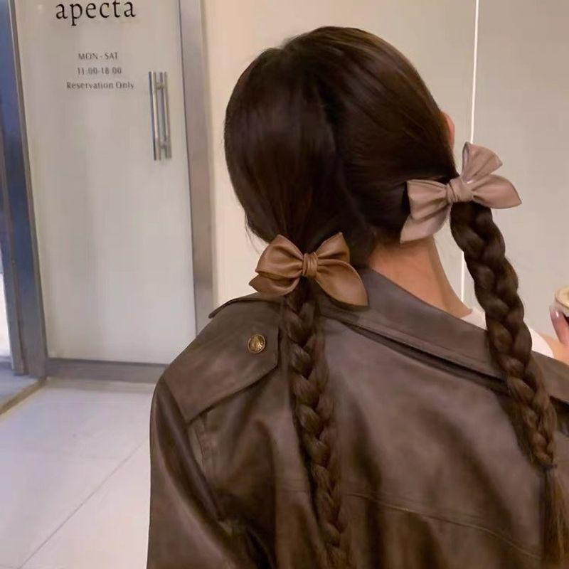 1pc Autumn and winter new PU leather bow hair clip temperament retro duckbill clip internet famous side clip