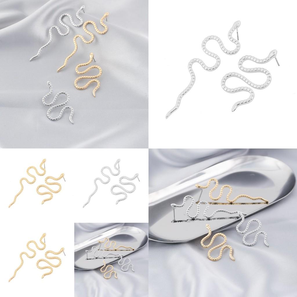 Elegant Gold And Silver Snake Earrings Modern And Fashionable Animal Inspired Jewelry