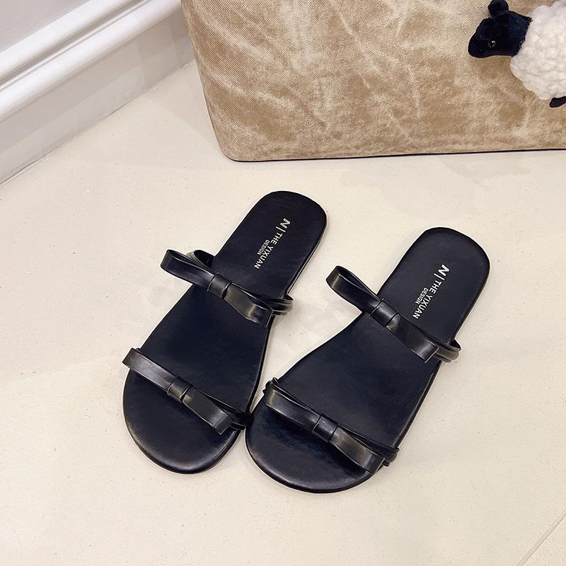 2025 summer new Korean version flat-bottomed slippers women's outer wear bow open-toed double belt fashion low-heeled sandals