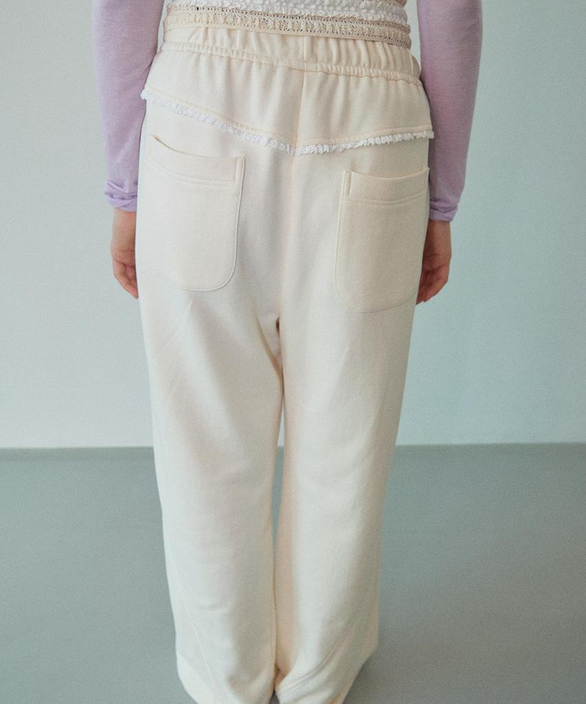 WOVEMENT Backside Lace Edge Sweatpants Cream Wbdfpa002Iv