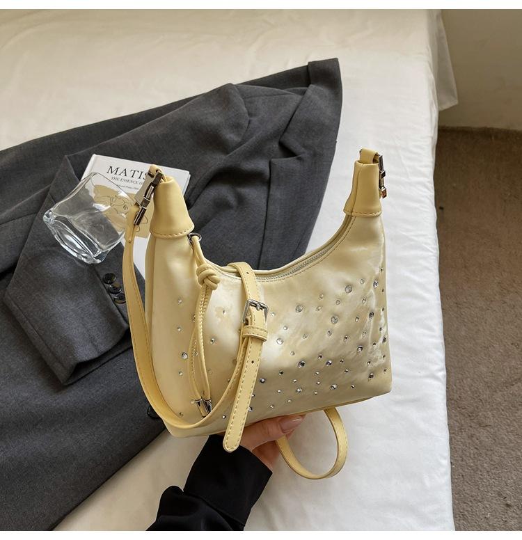 

Niche design handbag women s 2025 summer new messenger dumpling bag casual versatile commuter underarm shoulder bag жёлтый