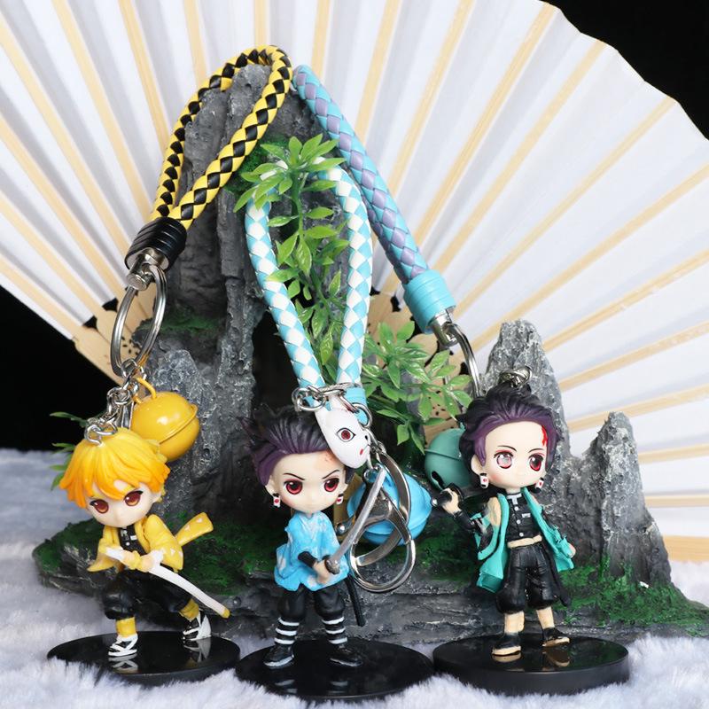 Trendy klíčenky Demon Slayer: Kreslené přívěsky na klíče od auta a přívěsky na tašku