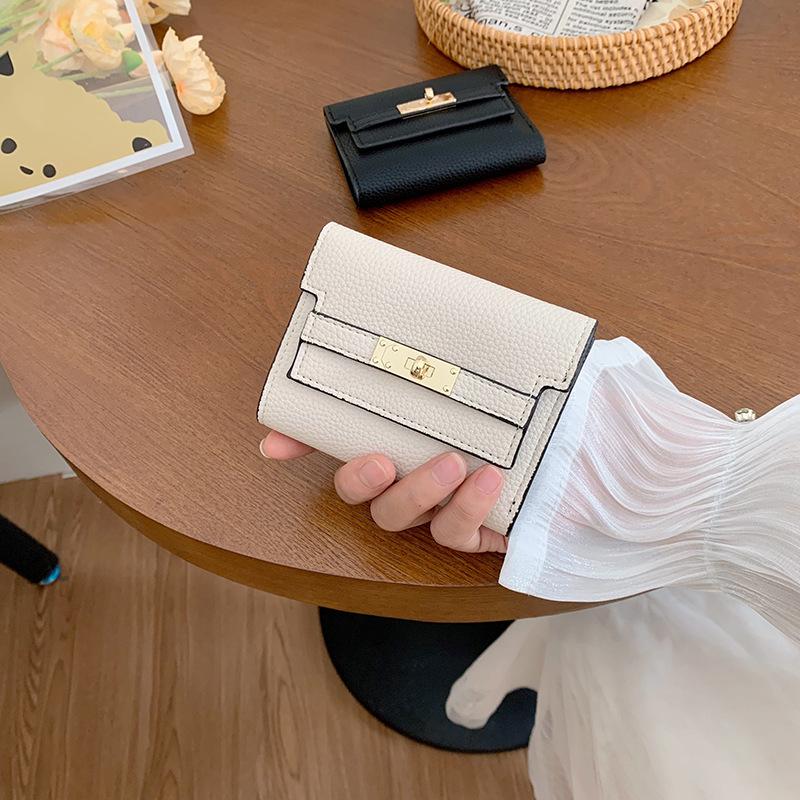 Women's Compact Foldable Wallet - Small Short Handbag.
