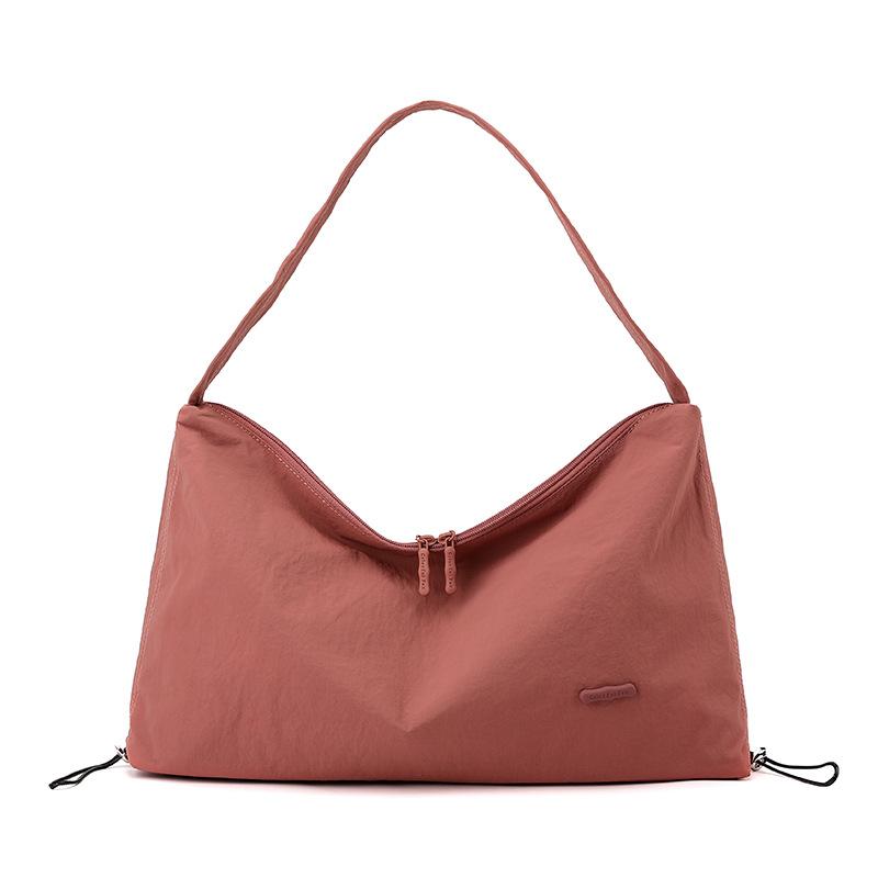Korean style spring and summer new women's solid color high-end niche shoulder crossbody armpit bag