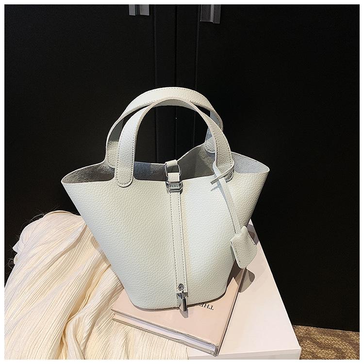 Niche fashion design bag women's 2025 new popular simple hand bag foreign style portable vegetable basket bucket bag