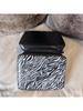 YSL Makeup Bag, Featuring a Zebra Print Design and Zipper Closure, Suitable for Everyday Use, Work, Travel, and School.