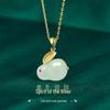 New Year Jade Rabbit Necklace: Women's Luxury Clavicle Chain with Imitation Hetian Jade Pendant and Titanium Steel Chain.