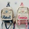 Personalized Hand-Embroidered Snap Backpack Travel Waterproof 2025 New Large Capacity Flower Decoration Simple Bags for Students