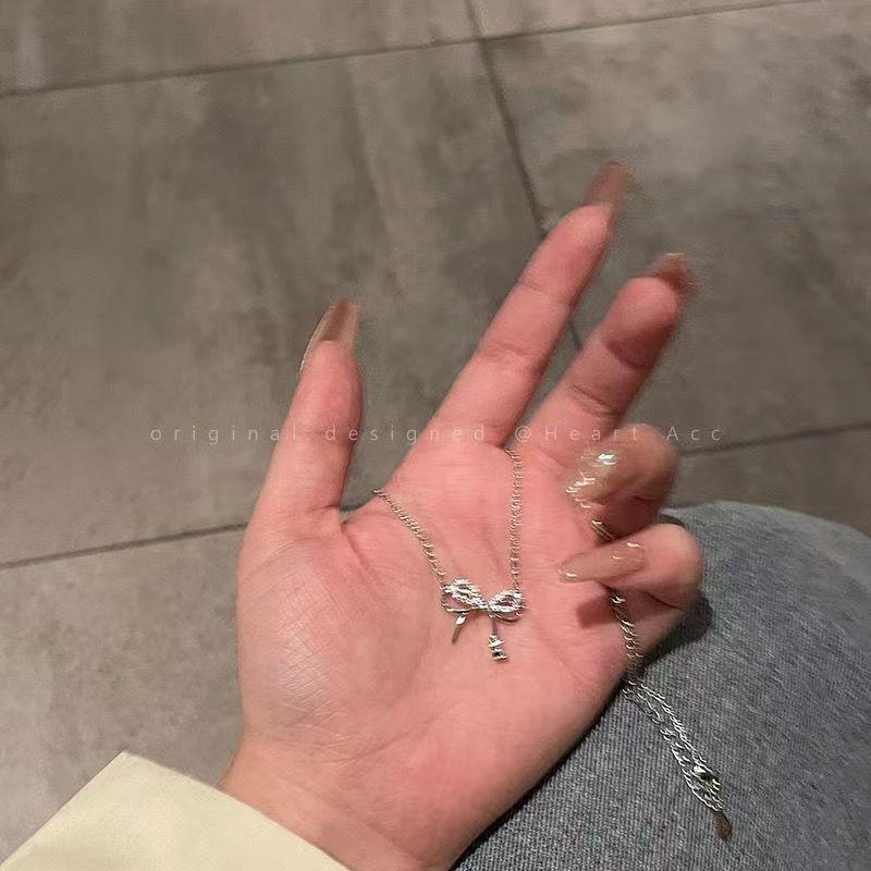 

Элегантное женское ожерелье с подвеской в виде банта и звезды - высококачественная легкая роскошная ключичная цепочка, идеально подходит для студенток или подруг