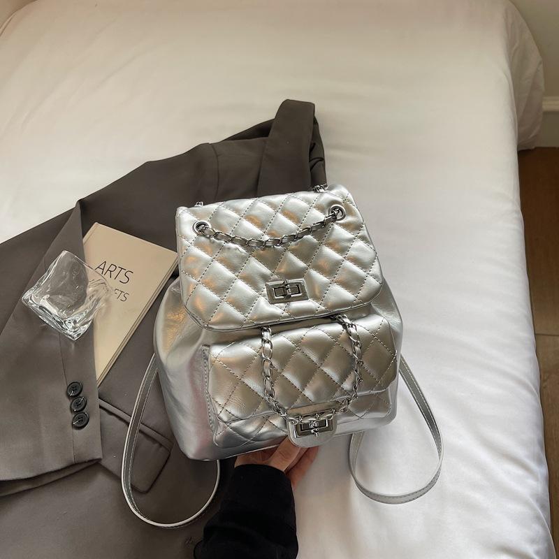 Korean niche chain lightweight small backpack women's 2025 summer new student commuting oblique span bag high value bag