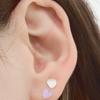 Own 14K pastel heart piercing