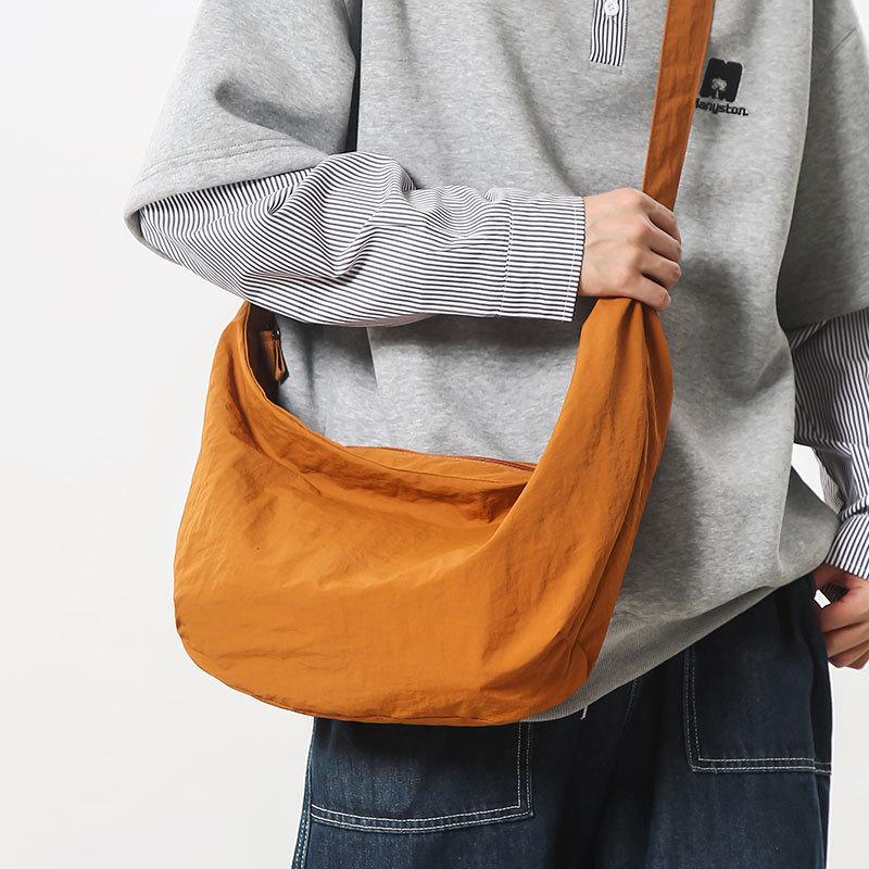 New Product Simple Solid Color Nylon Cloth Dumpling Bag Large Capacity Light Leisure Versatile Commuter Travel Messenger Bag