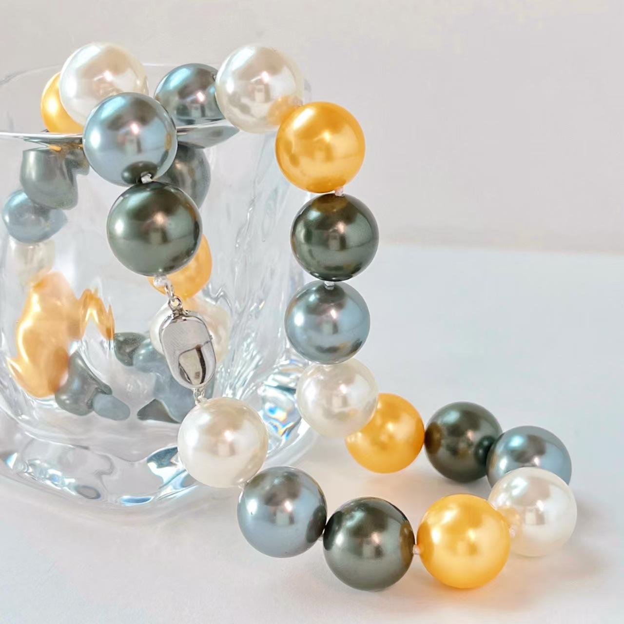 

Винтажное 16-мм крупнозернистое черное золото Таити Имитация Хрусталя Жемчуг Ожерелье Ключица