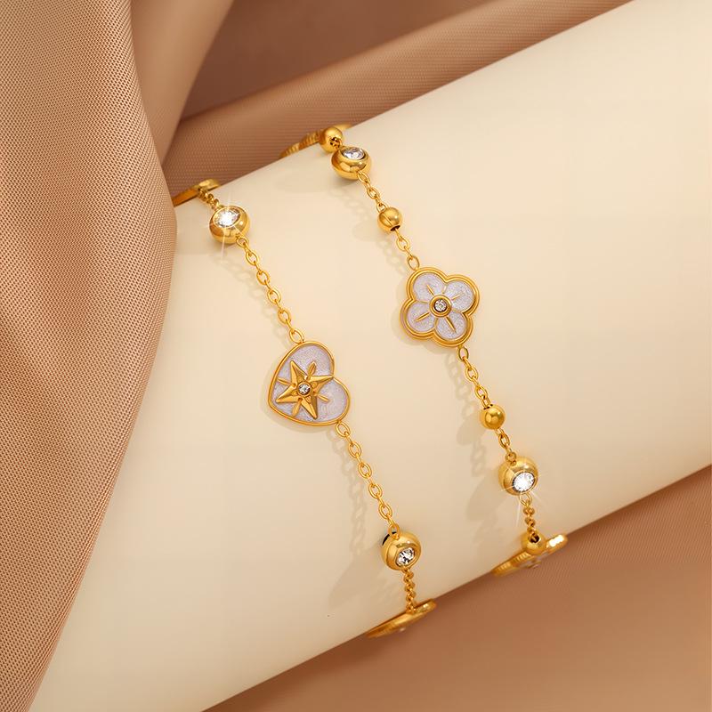 Elegant Women's Titanium Steel Bracelet with Diamond-Embedded Four-Leaf Clover and Eight-Pointed Star Design