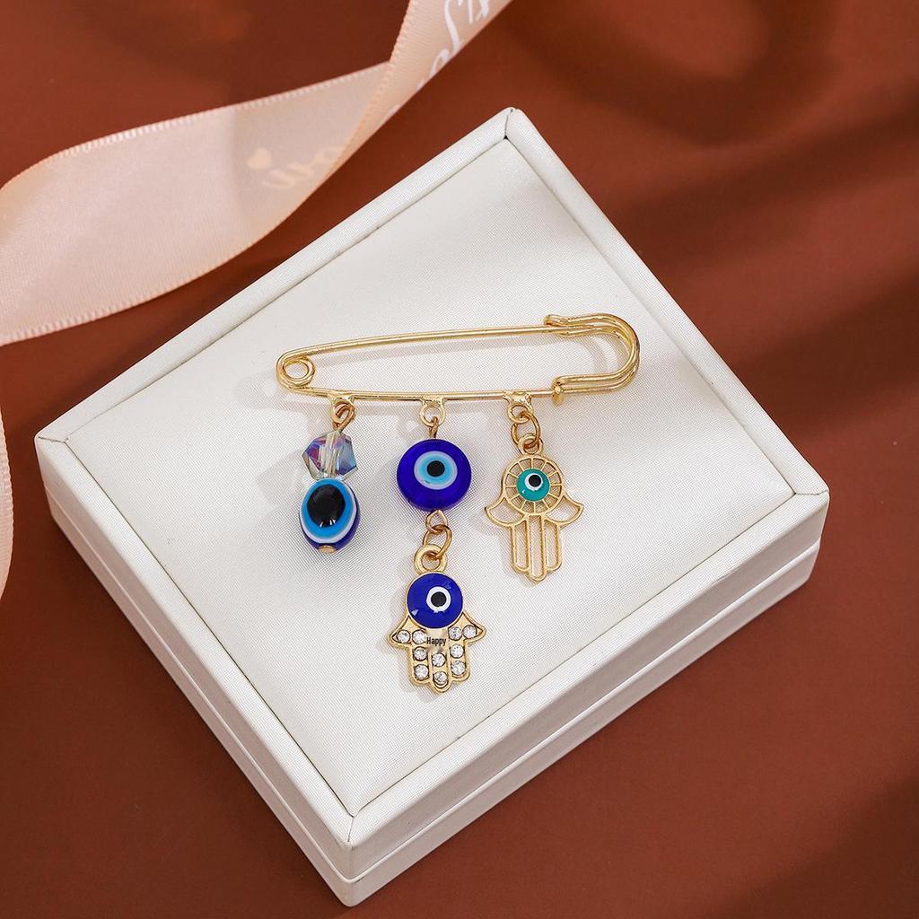 Creative Rhinestone Devil's Eye Tassel Brooch: Women's High-End Blue-Eyes Sweater Pin