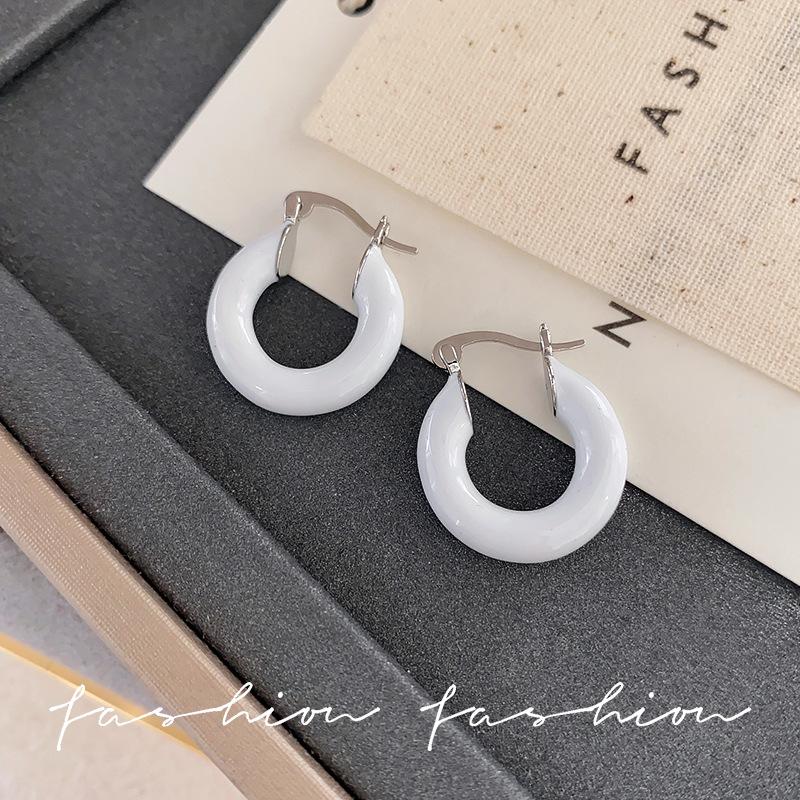 

European and American zircon enamel ear buckle women s light luxury niche design sense high-grade unique earrings temperament earrings new models