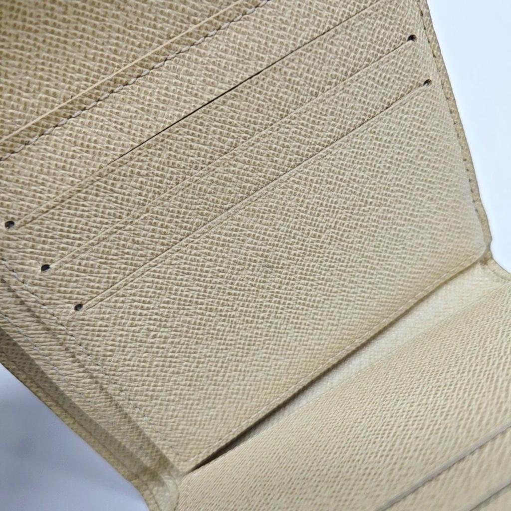 [Pre-Owned] White Coated Canvas Wallet - Good #1C3W7ZM
