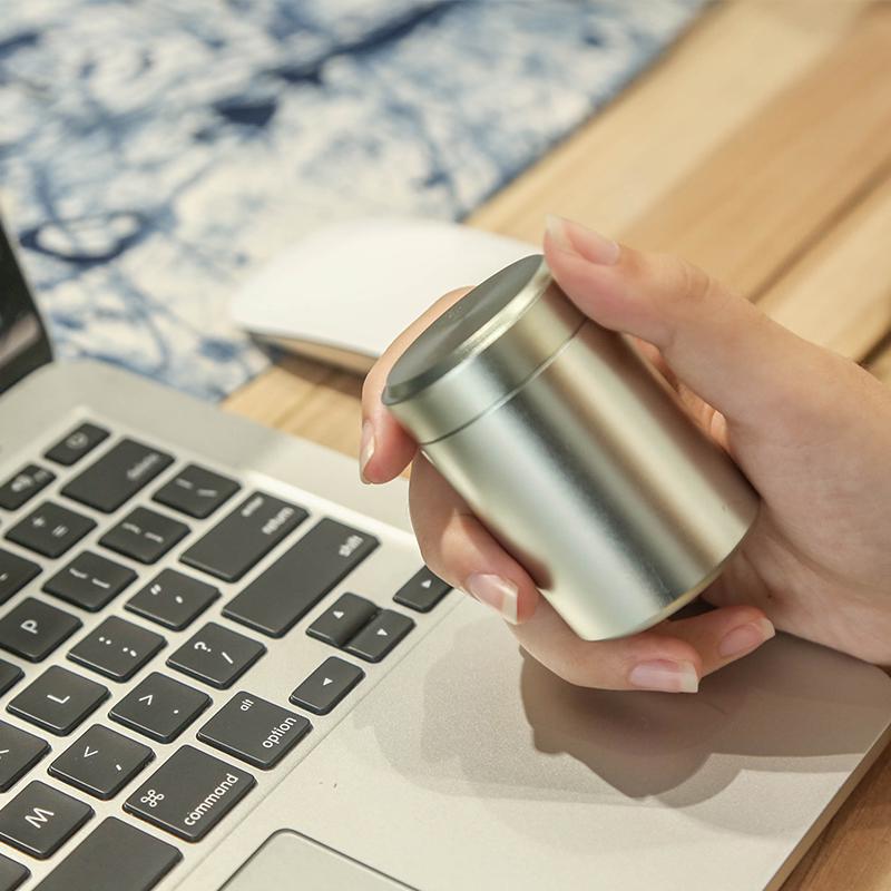 Compact Titanium-Aluminum Tea Storage Can: Small, Portable, and Sealed.