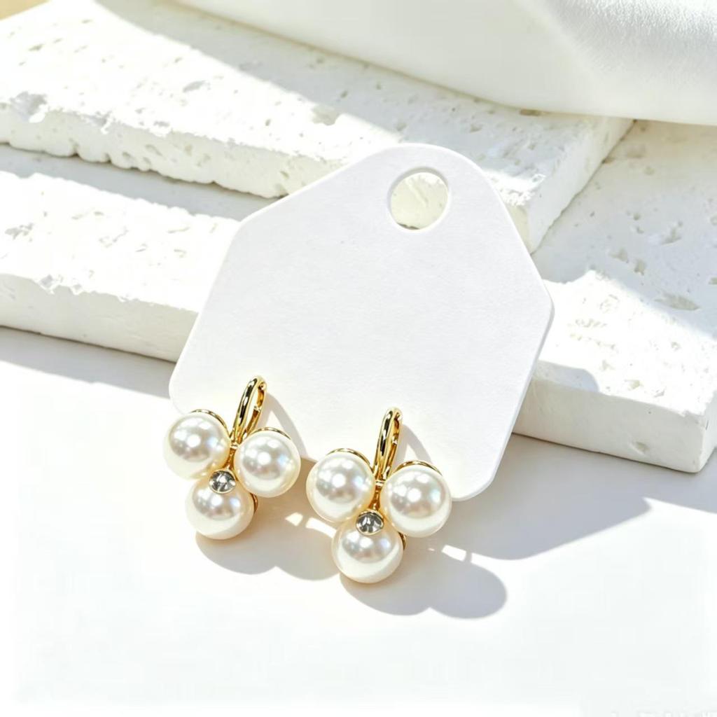 2024 Luxury Pearl Stud Earrings for Women - Elegant High-End Design