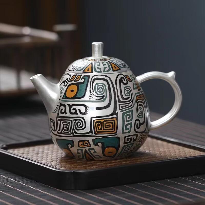 Elegant Silver Inlaid Ceramic Taotie Dragon Egg Teapot