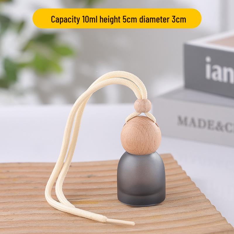 Frosted Glass Car Diffuser Bottle with Lanyard for Essential Oils - Refillable and Ideal for Home or Wardrobe Decor.