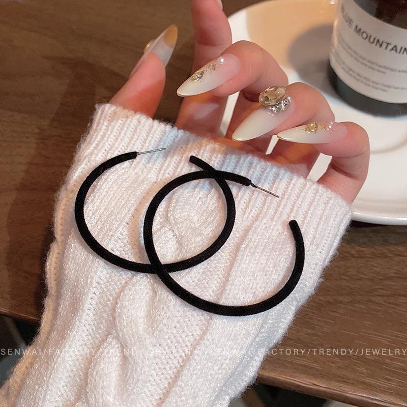 

Autumn and winter flocking plain ring earrings women s personality exaggerated large circle stud earrings niche high-end ear accessories