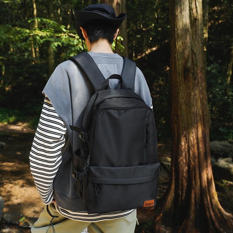 New backpack men's large-capacity high-end school bag female junior high school students high school students simple casual computer backpack