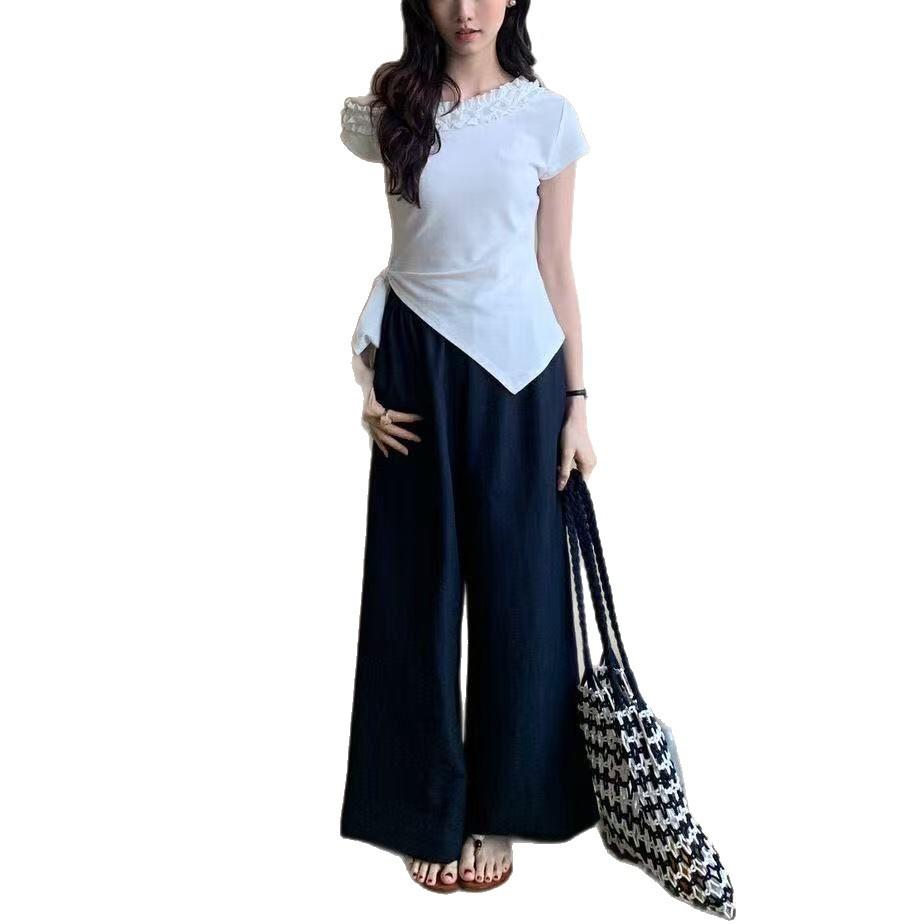 Summer new Korean version fashion design sense fungus edge slanted shoulder short-sleeved T-shirt women's slim irregular strap top