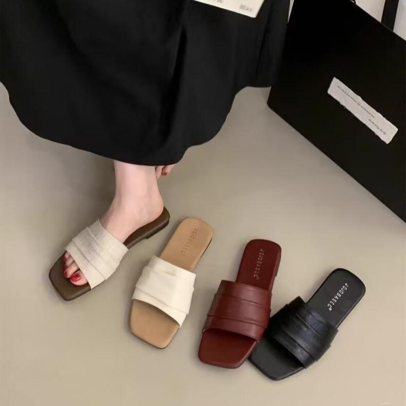 Folded soft leather slippers for women to wear summer soft flat-bottomed seaside vacation beach shoes one-word sandals