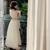 Design sense French niche hollow sleeveless neck sling dress backless strap gentle wind temperament long skirt