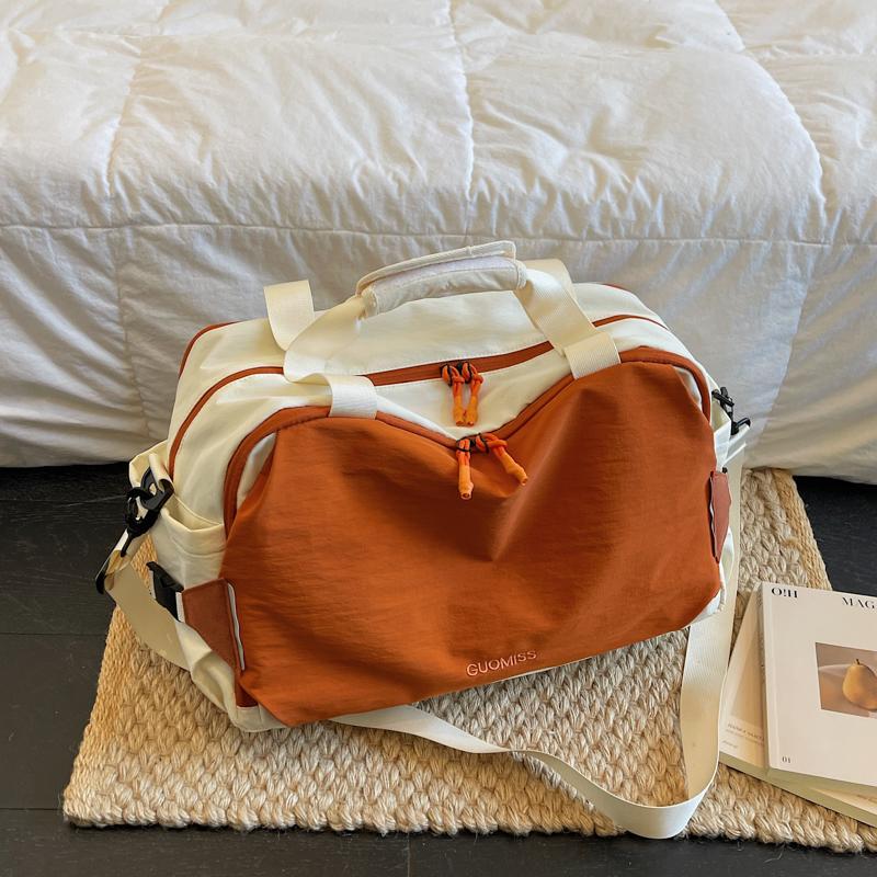 Compact Travel Duffel Bag with Adjustable Shoulder Strap Multiple Pockets Lightweight Weekender Bag