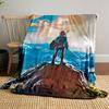 A figure with sword and shield stands on a rock, overlooking a vast landscape. for all seasons blanket lunch break throw gift