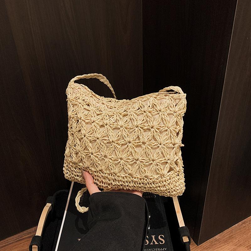 

Summer woven shoulder bag women s new seaside vacation straw bag versatile large-capacity messenger bag