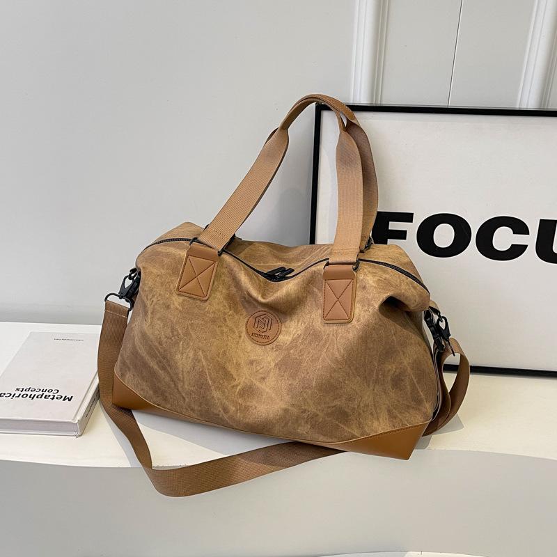 Large-capacity hand-held travel bag Women's fashion and light going out luggage bag Men's business trip travel storage boarding bag