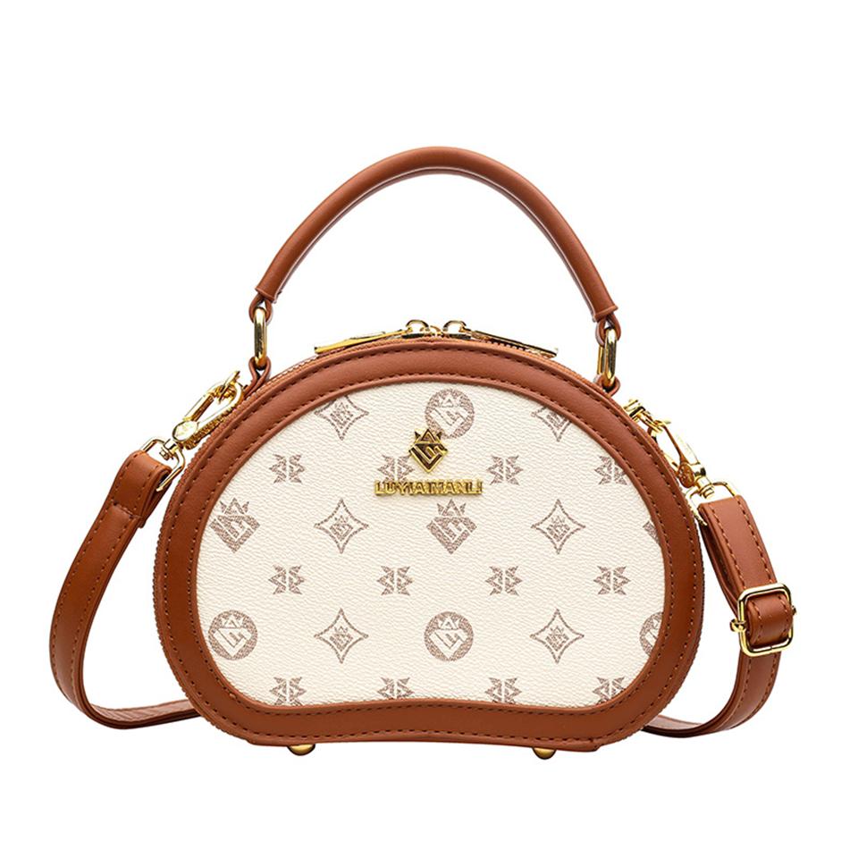 

Шикарная женская сумка через плечо Элегантный овальный дизайн Съемный ремень Мода и функциональность Премиум кожа Идеал