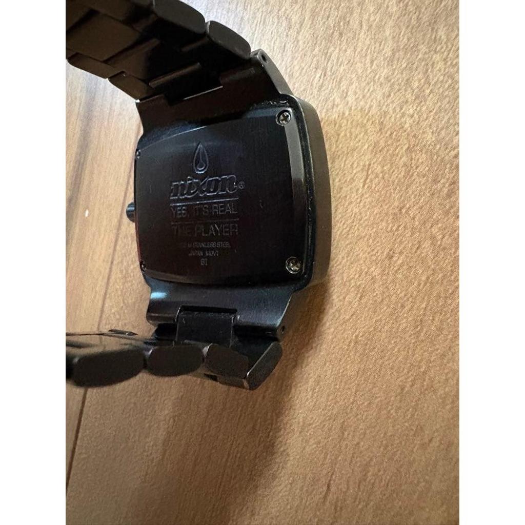 Used NIXON watch black gold