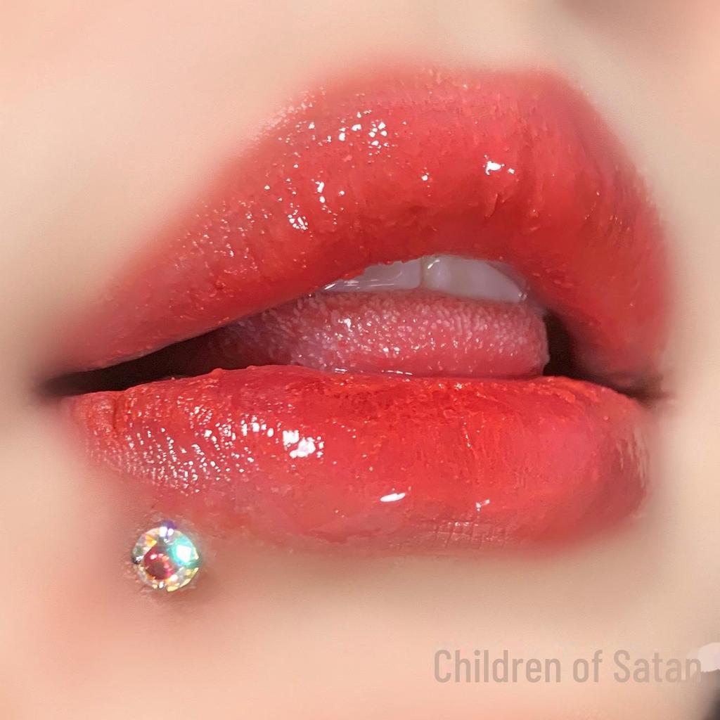 'Satan's Child: Luxury Diamond Lip and Ear Studs for Bold Women'