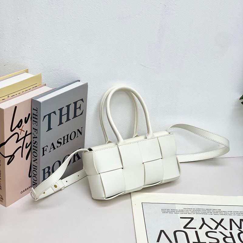 2024 Early spring new leather woven vegetable basket bag women's hand shoulder messenger bag small mini versatile