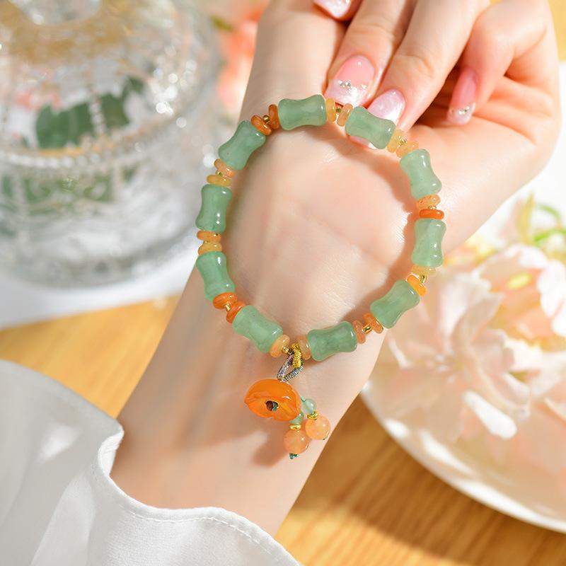 

Natural Green Aventurine Bamboo Bracelet with Lotus Seed Pod and Leaf Pendant - Elegant Chinese Style