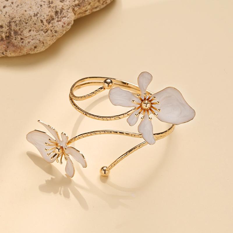 Stylish and sexy floral open-face bracelet perfect for everyday wear holidays and parties; adjustable bracelet