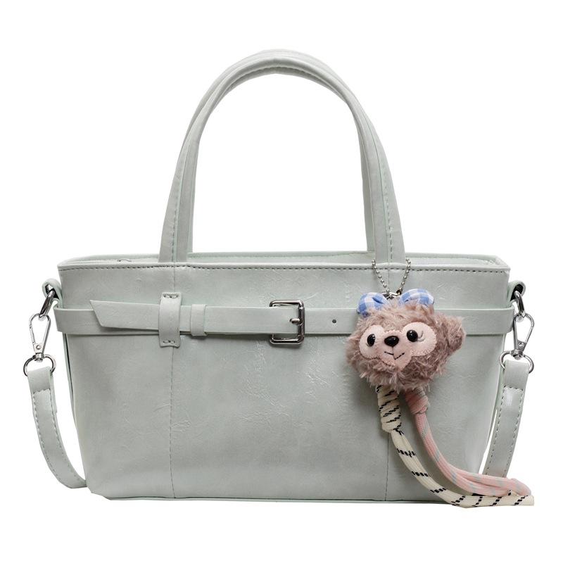 Popular new Korean version of niche casual oil wax leather portable bucket bag fashionable and simple commuter versatile messenger women's bag