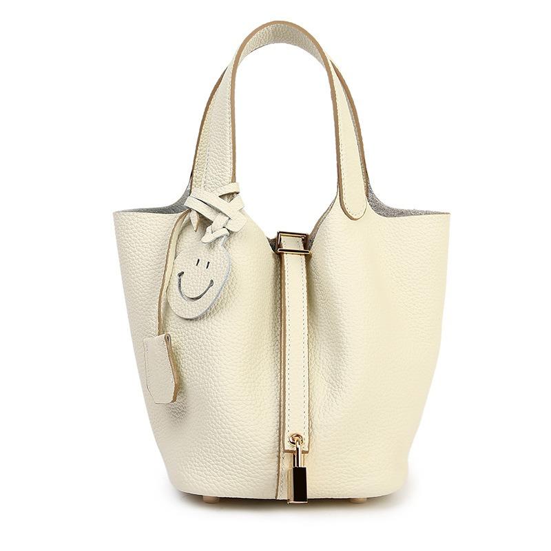 Erste Schicht Rindsleder Tasche Damen neue Retro vielseitige Handtasche echtes Leder Damen Tasche Gemüsekorb Beuteltasche