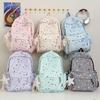 Schoolbag new schoolbag female junior high school student star printing Korean version niche ins backpack Mori college student computer bag