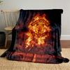 A Fiery Manchester United Logo Emerges Against Smoke and a Dark Background. for All Seasons Blanket Lunch Break Throw Gift