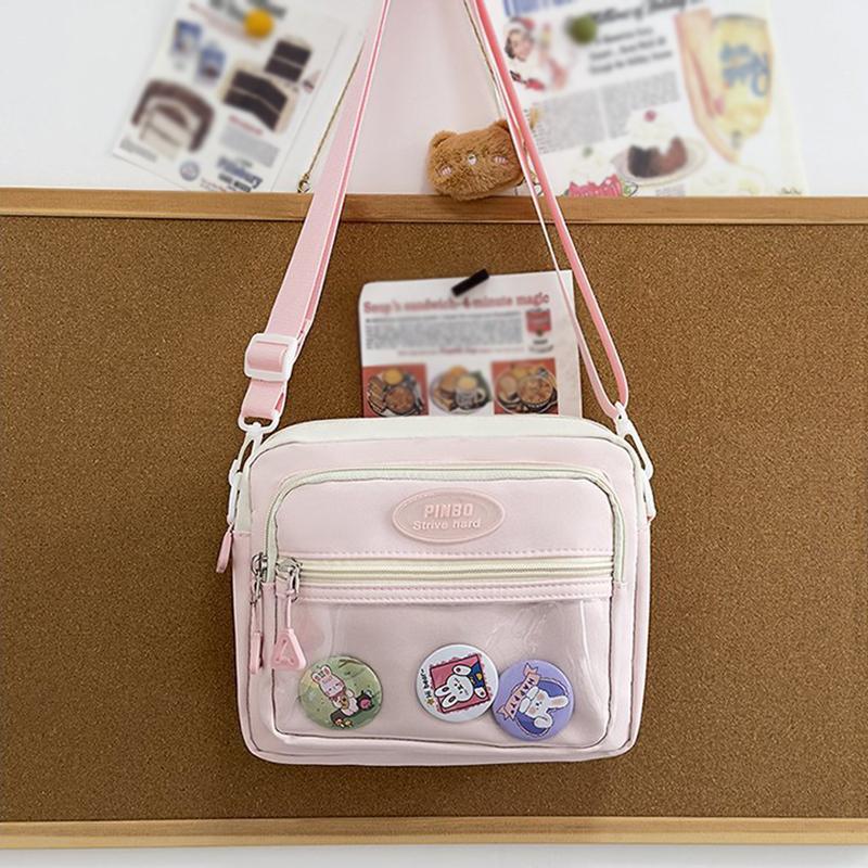 

2025 Новая модная сумка через плечо в корейском стиле Милая сумка через плечо Сумка-мессенджер в стиле аниме Нейлоновая студенческая сумка 22*6*18cm розовый