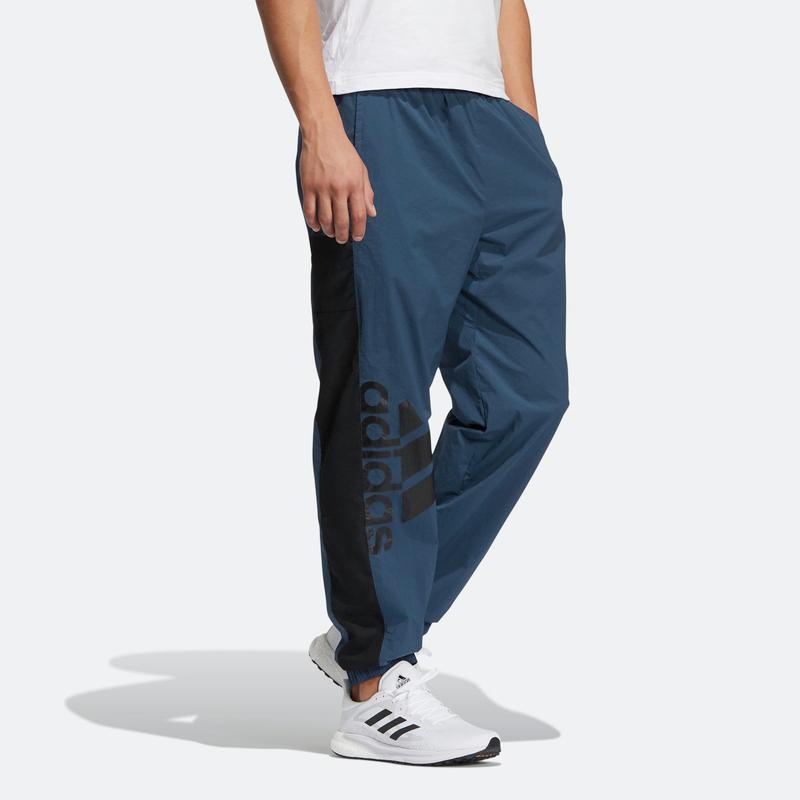 Adidas Pánské modré tepláky s logem z prošívaných písmen GN0783