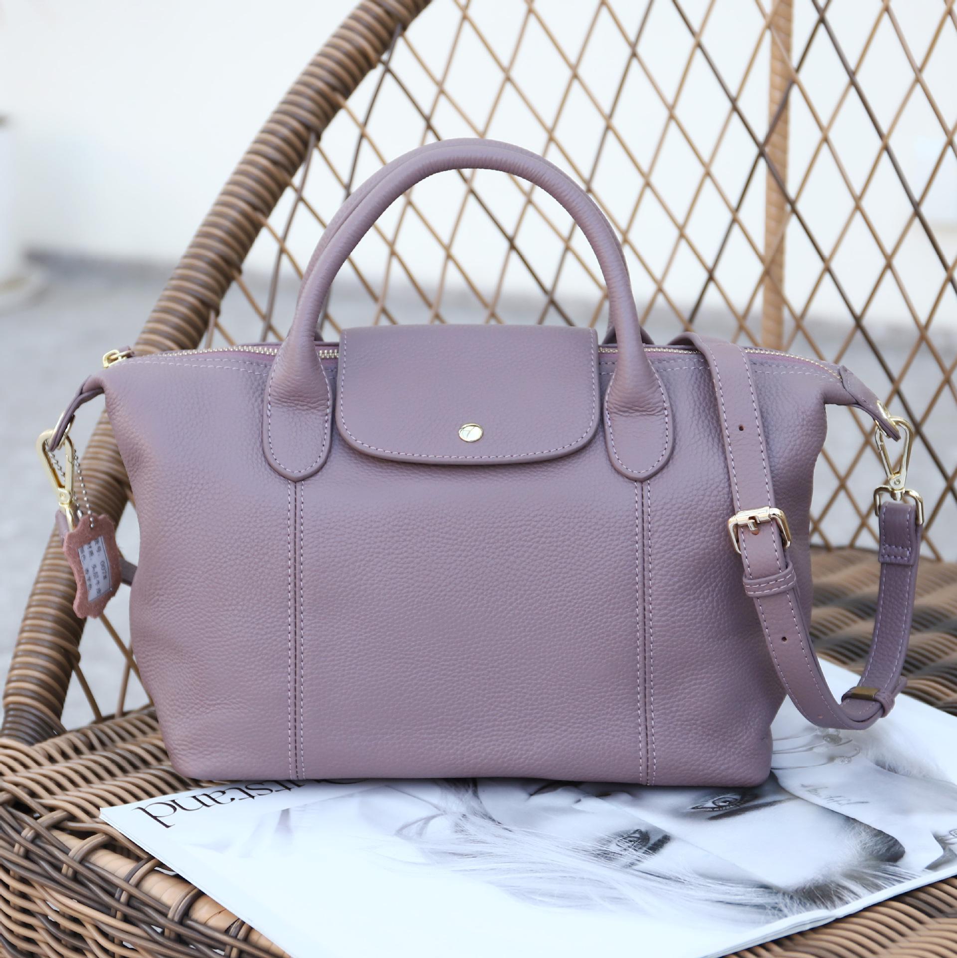 

Новая стильная женская сумка Boston из натуральной коровьей кожи большой вместимости 38L x 15W x 20H CM лиловый