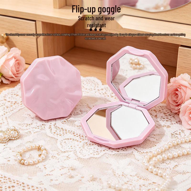 Portable Double-Sided Folding Mirror - Compact, Durable Handheld for Home or Travel.