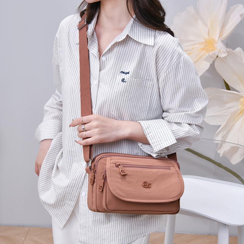 Kompaktní crossbody taška s více kapsami na zip pro muže a ženy