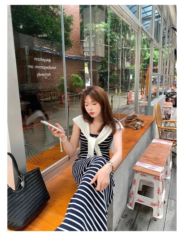 Neues Mode gestreiftes ärmelloses koreanisches glockenförmiges Kleid